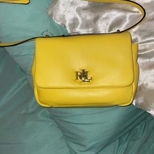 Small yellow Ralph Lauren purse brand new with tags